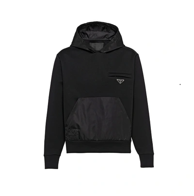 Black Hoodie with triangle logo.